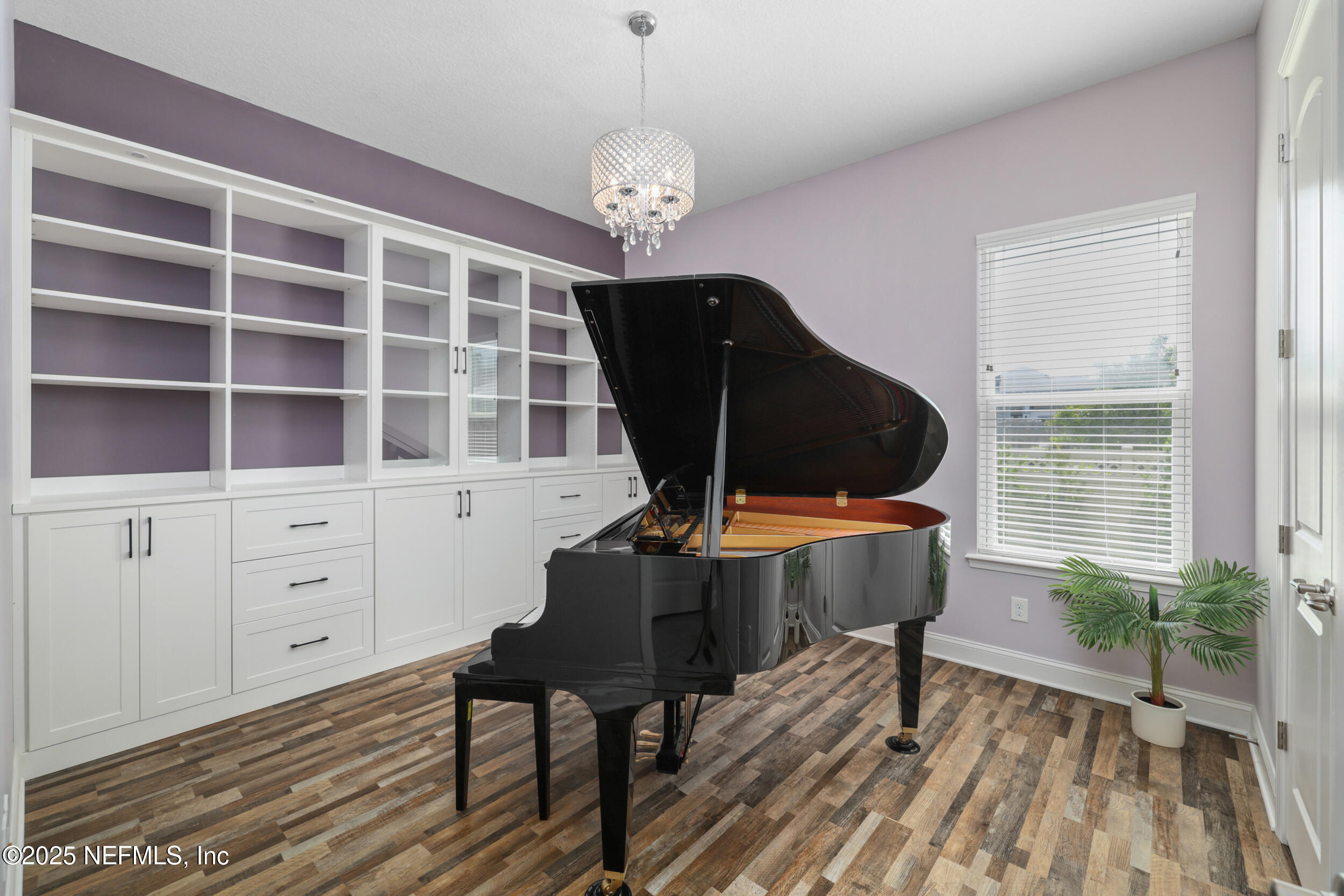 318 Windwalker Drive St. Augustine, FL 32092 - Photo 43 of 54 a living room with furniture and wooden floor