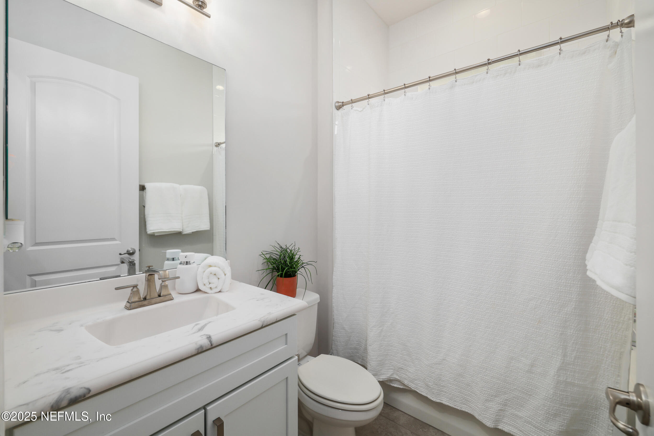 318 Windwalker Drive St. Augustine, FL 32092 - Photo 46 of 54 a bathroom with a sink toilet and shower