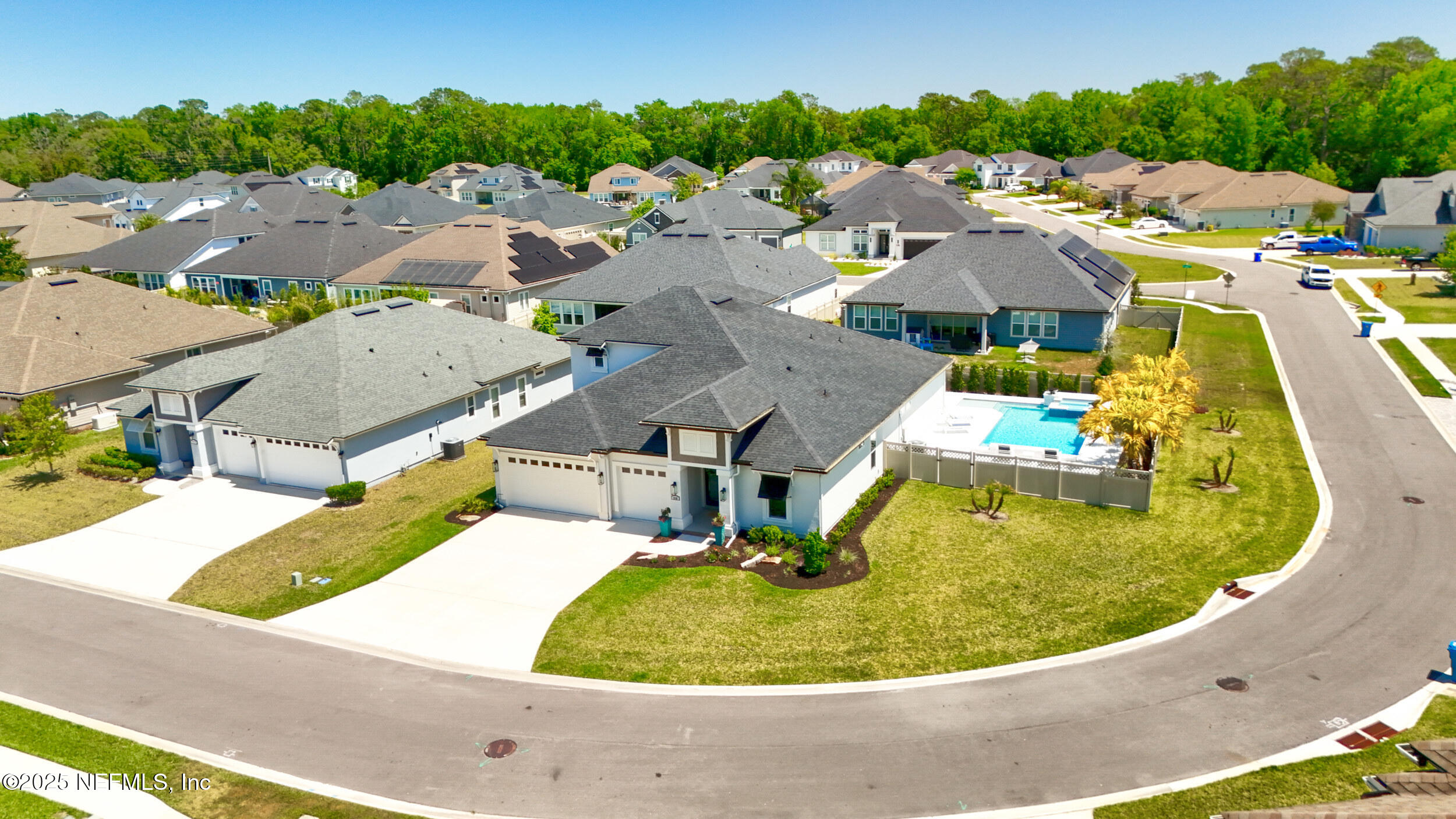 318 Windwalker Drive St. Augustine, FL 32092 - Photo 5 of 54 an aerial view of a swimming pool