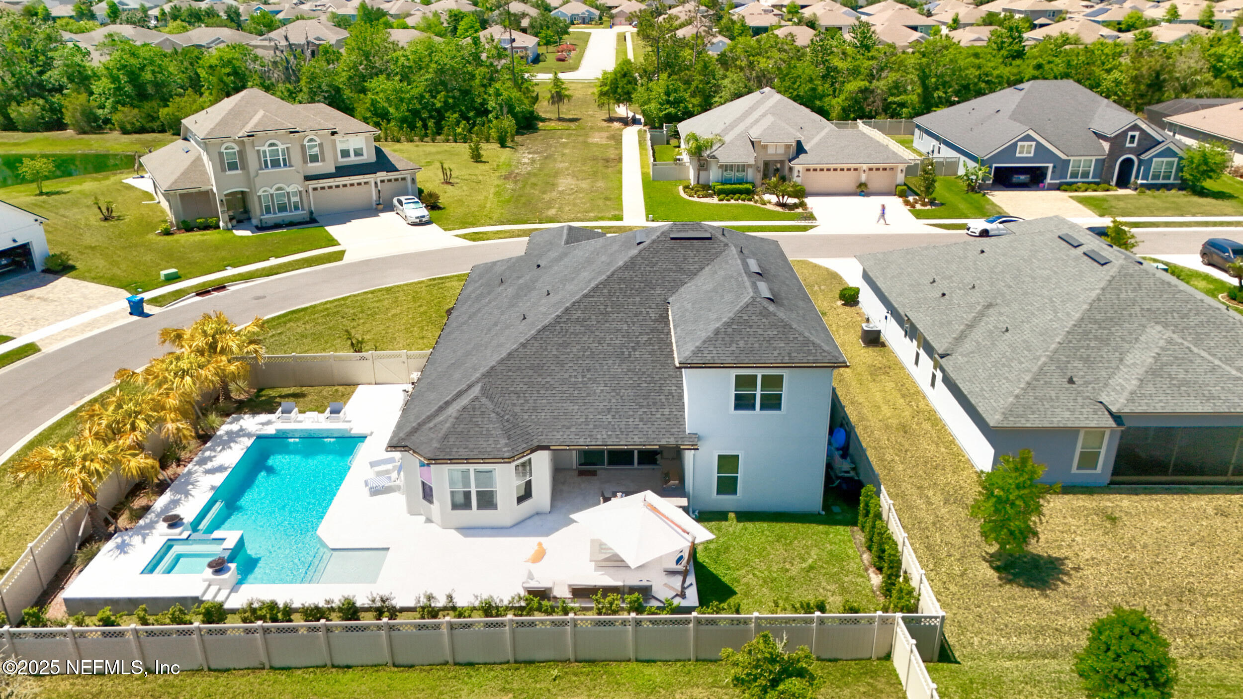318 Windwalker Drive St. Augustine, FL 32092 - Photo 53 of 54 an aerial view of a house with swimming pool