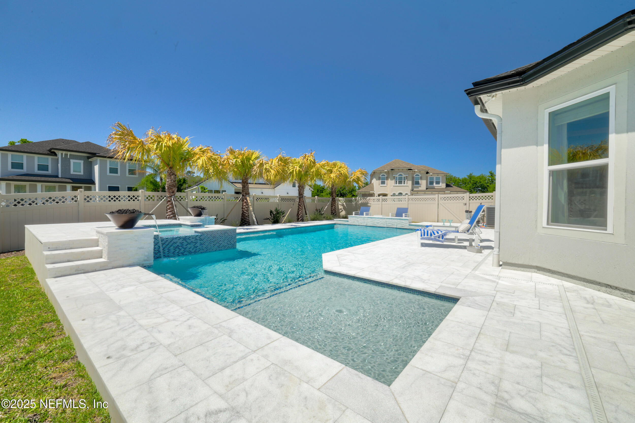 318 Windwalker Drive St. Augustine, FL 32092 - Photo 9 of 54 a view of a house with a yard porch and sitting area