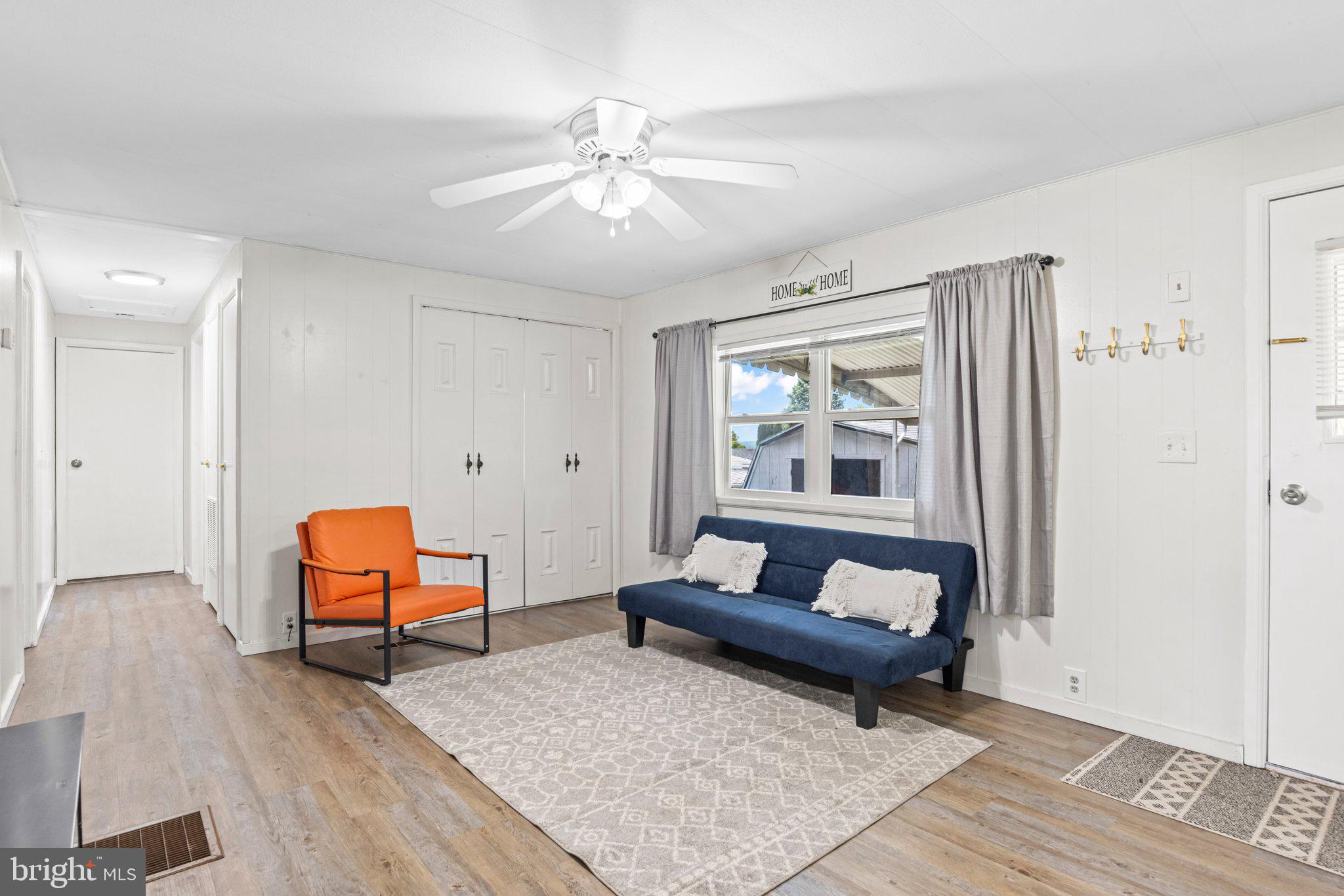 25 Ridgewood Manor Manheim, PA 17545 - Photo 14 of 36 a living room with furniture and a window