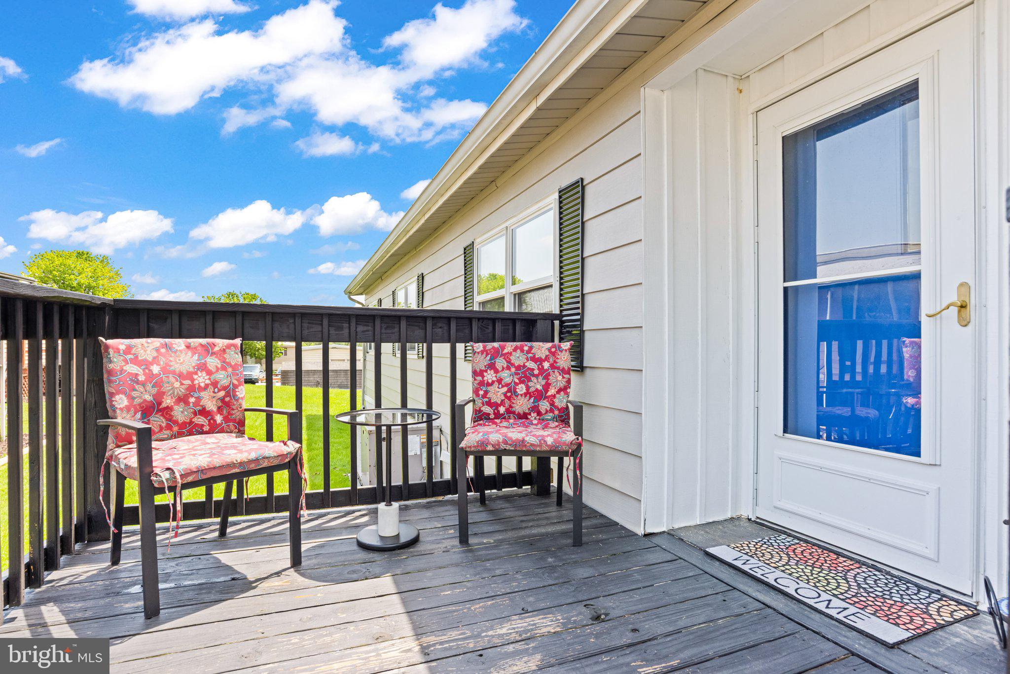 25 Ridgewood Manor Manheim, PA 17545 - Photo 2 of 36 a view of a dinning room with wooden floor and outdoor seating