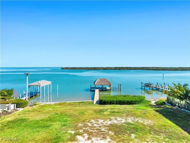 a view of water heater and covered with wooden fence