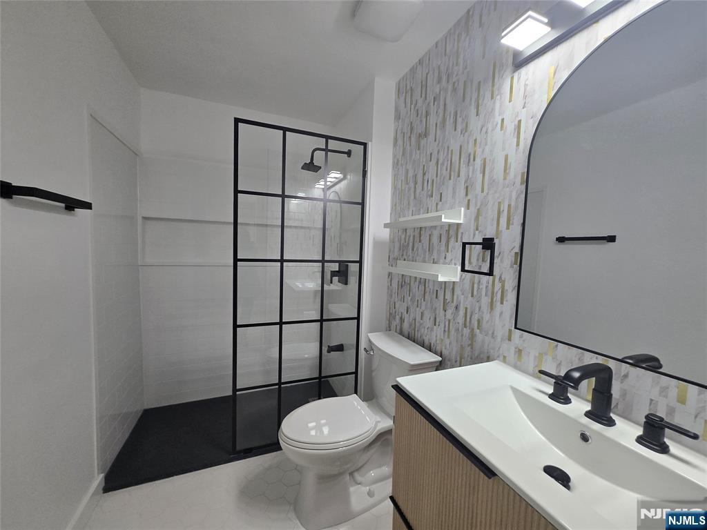 2080 Drake Court Mahwah, NJ 07430 - Photo 11 of 23 a bathroom with a sink toilet and shower