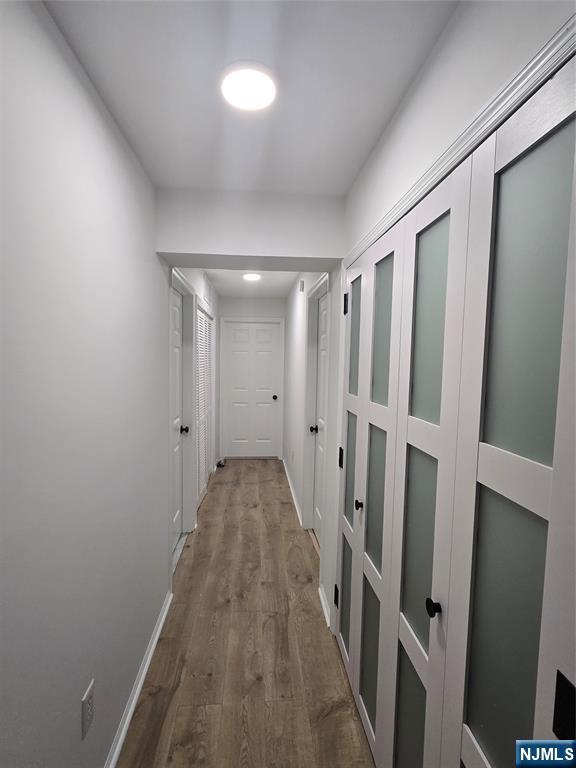 2080 Drake Court Mahwah, NJ 07430 - Photo 15 of 23 a view of a hallway with wooden floor and staircase