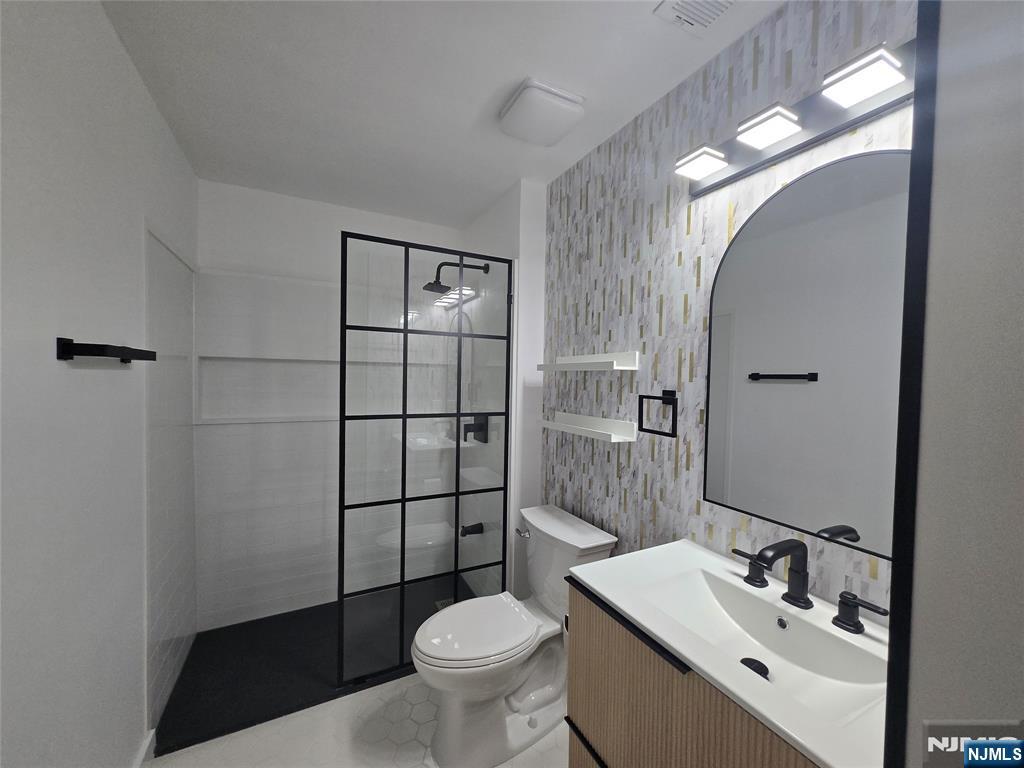 2080 Drake Court Mahwah, NJ 07430 - Photo 23 of 23 a bathroom with a sink toilet and shower