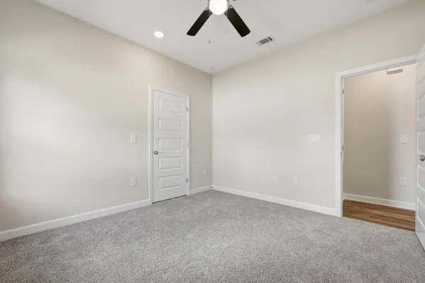 a view of a room with an empty space