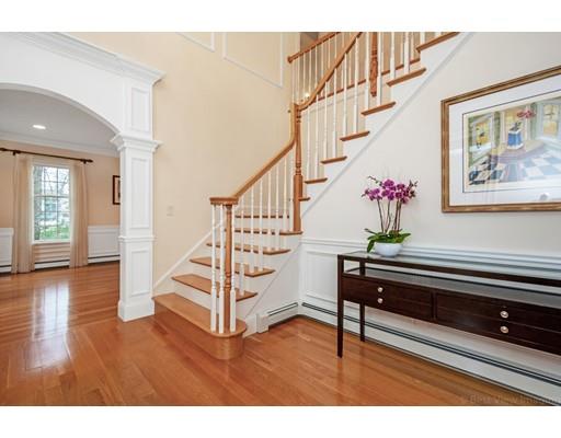 90 Fox Run Road Bolton, MA 01740 - Photo 3 of 30 a view of entryway with wooden floor and stairs