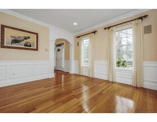 90 Fox Run Road Bolton, MA 01740 - Photo 4 of 30 a view of an empty room with wooden floor and a window