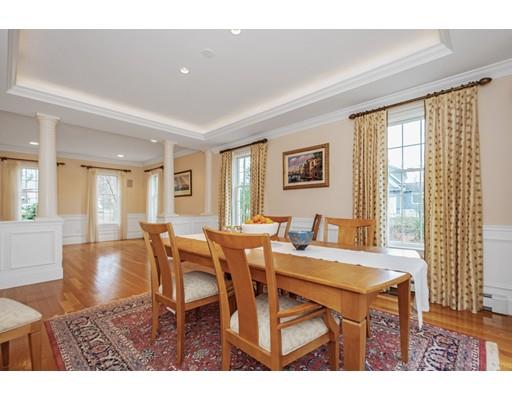 90 Fox Run Road Bolton, MA 01740 - Photo 5 of 30 a view of a dining room with furniture and wooden floor