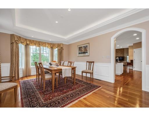 90 Fox Run Road Bolton, MA 01740 - Photo 6 of 30 a view of a dining room with furniture and wooden floor