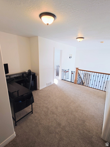 552 Sunset Crest Way Draper, UT 84020 - Photo 30 of 68 Carpeted home office with a textured ceiling