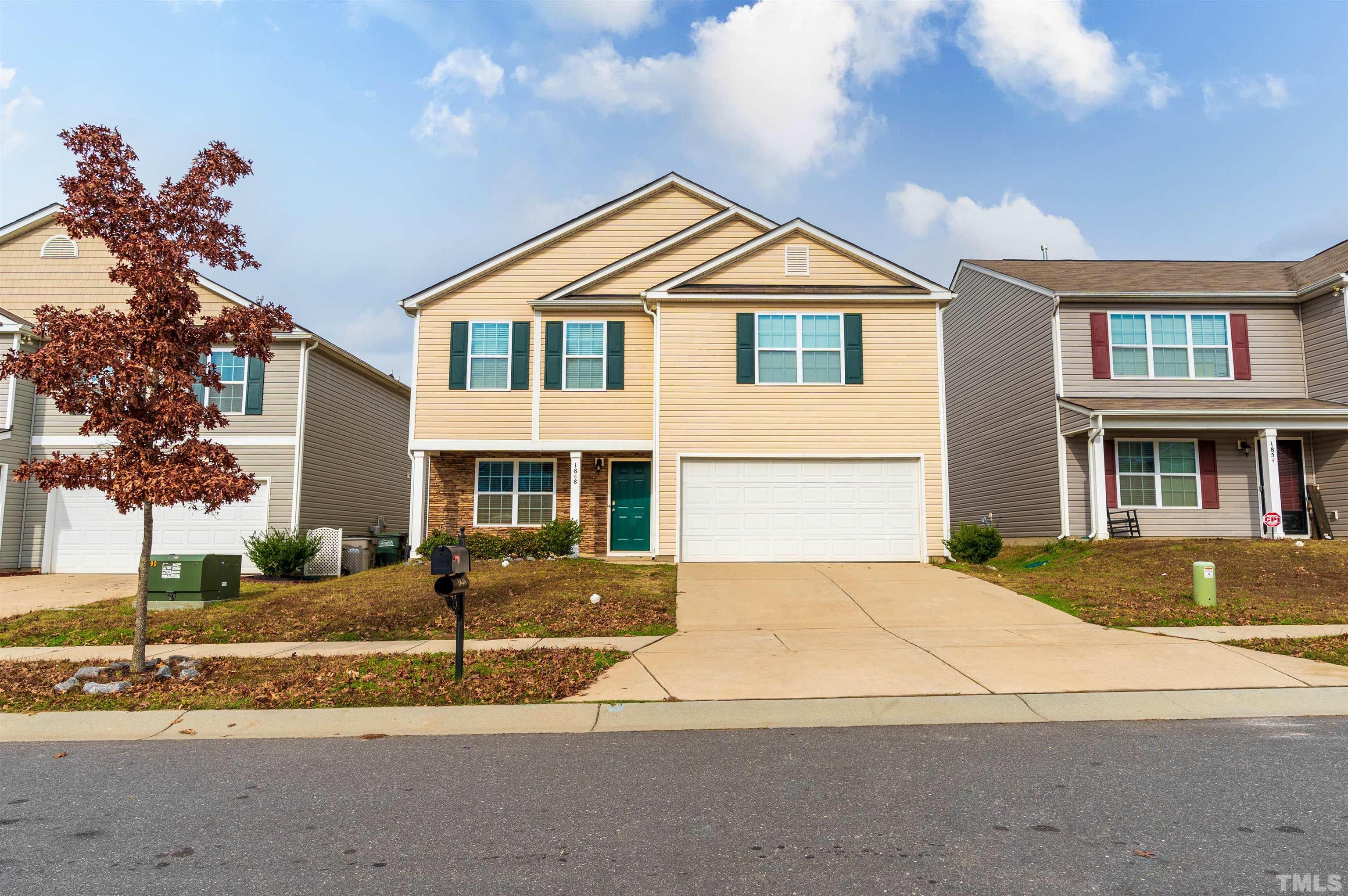 1848 Greenbrook Trail Dallas, NC 28034 - Photo 1 of 19 a front view of a house with a yard