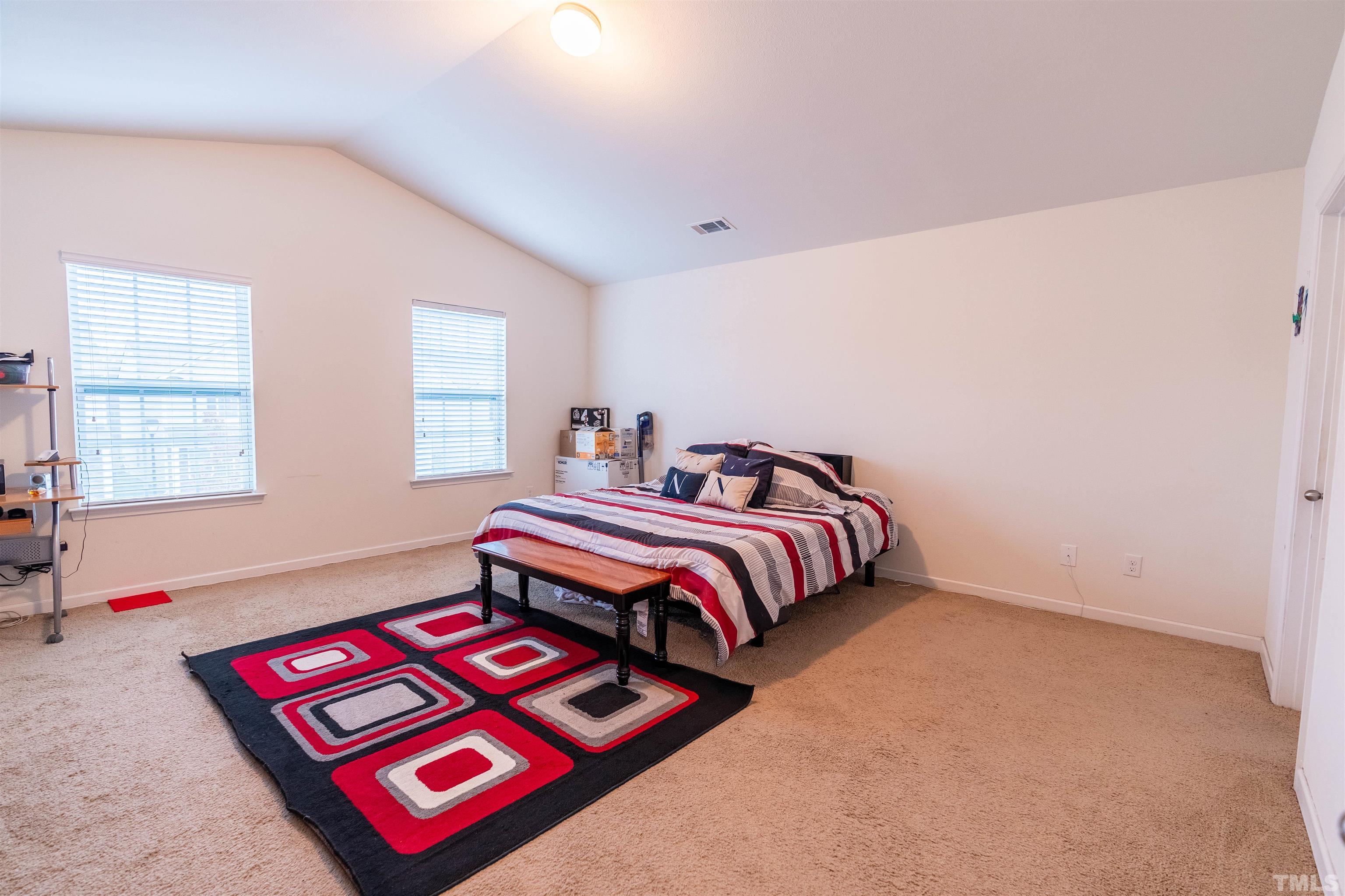 1848 Greenbrook Trail Dallas, NC 28034 - Photo 12 of 19 a bedroom with bed and a window