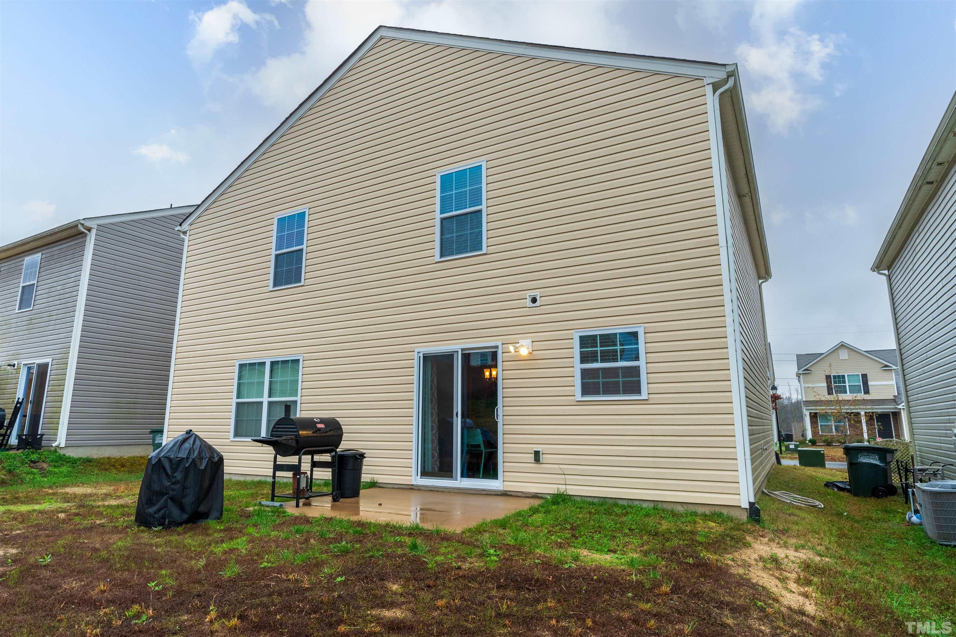 1848 Greenbrook Trail Dallas, NC 28034 - Photo 17 of 19 a view of backyard of house with outdoor seating