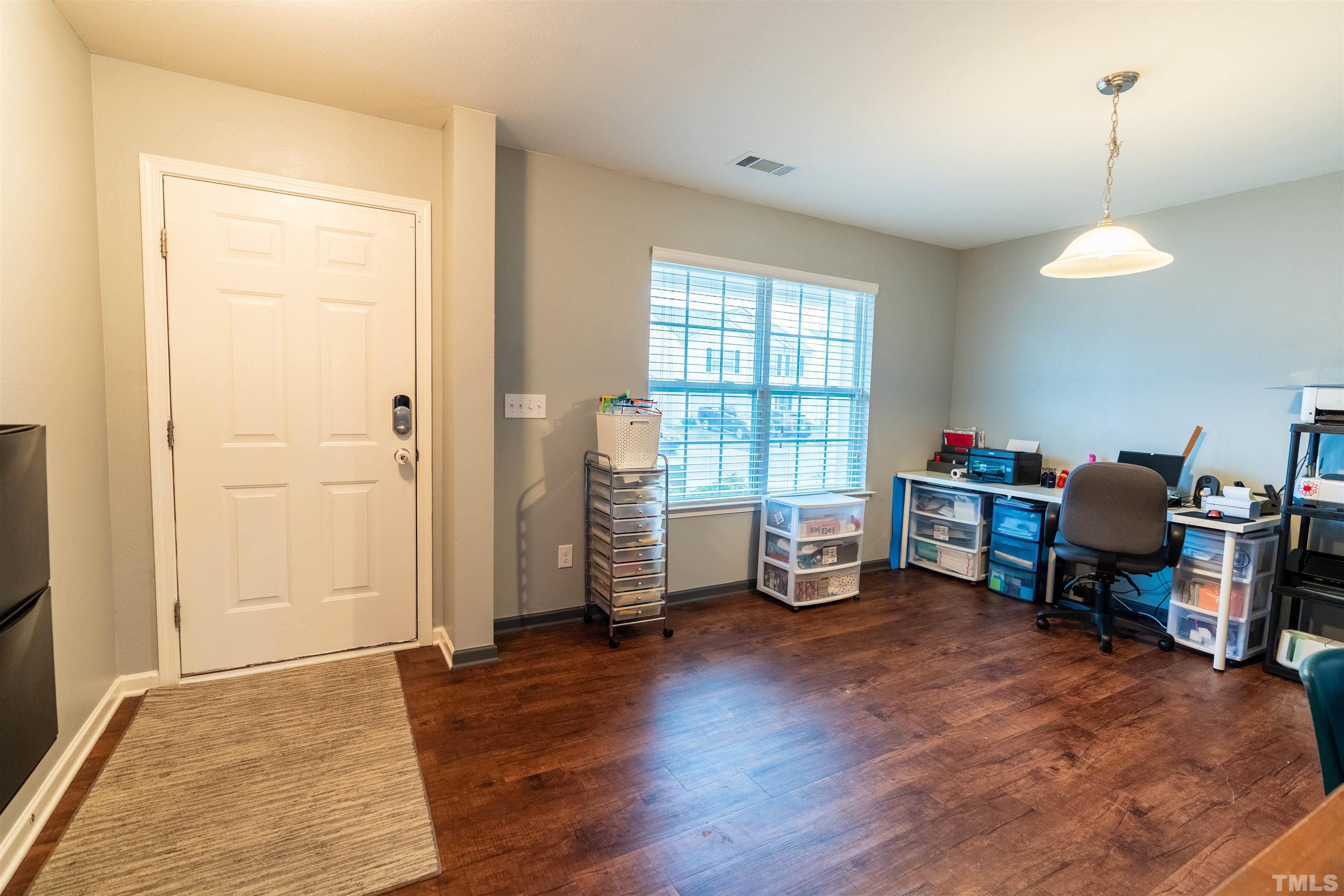 1848 Greenbrook Trail Dallas, NC 28034 - Photo 4 of 19 a view of a livingroom with workspace and a window