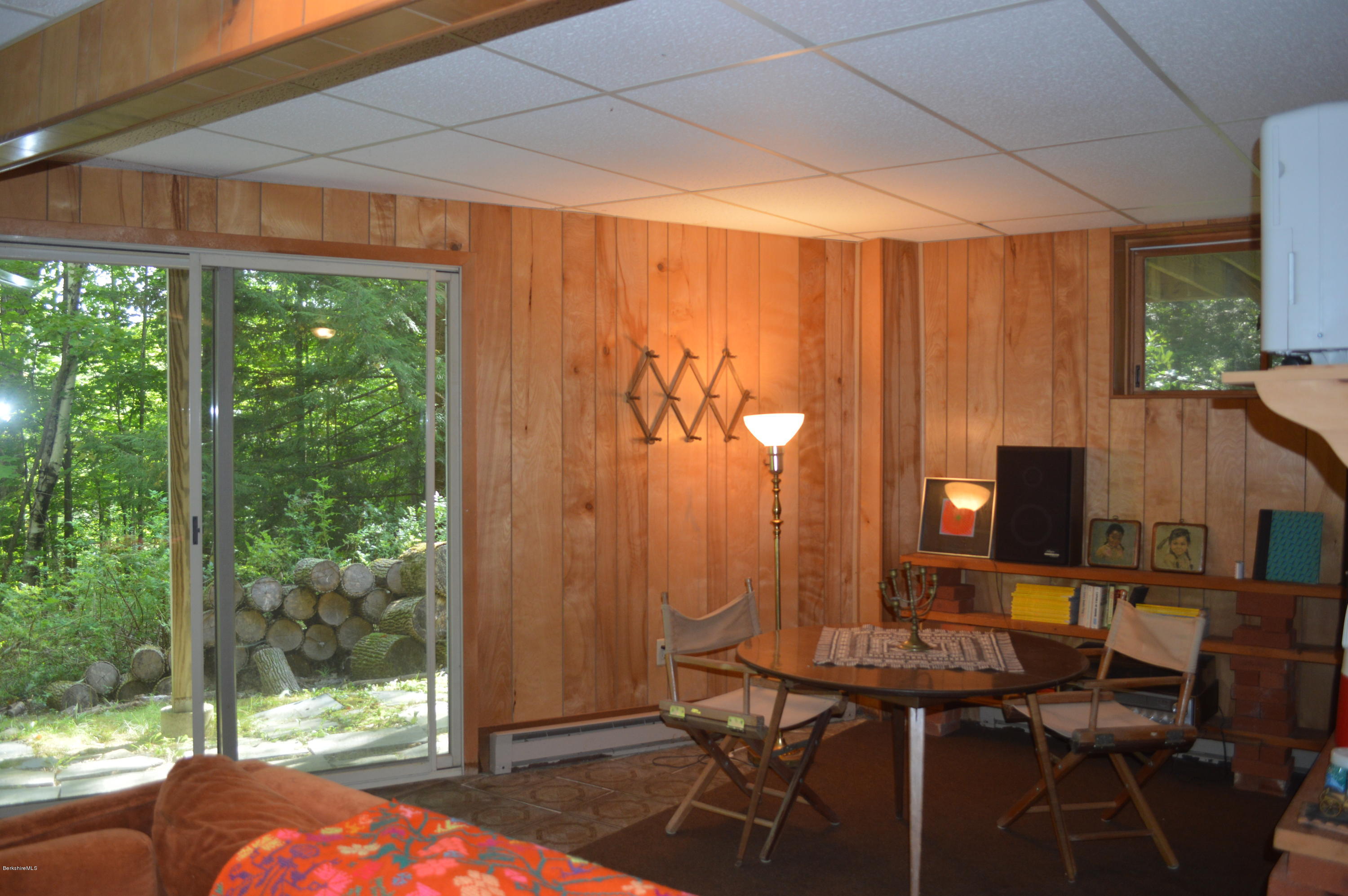 9 Mcdarby Road Tyringham, MA 01238 - Photo 7 of 15 a view of a balcony with chairs and a table