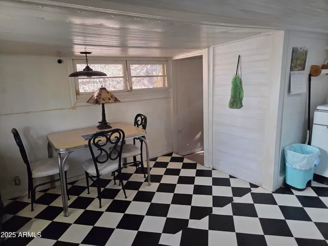 a black and white checkered floor with a black white checkered floor