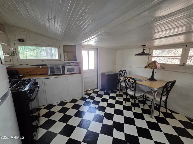 a black and white checkered floor with a black white checkered floor