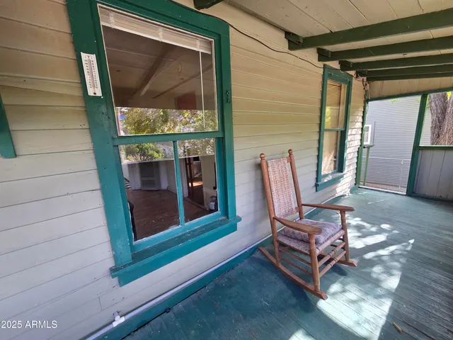 a view of a two chair in the balcony