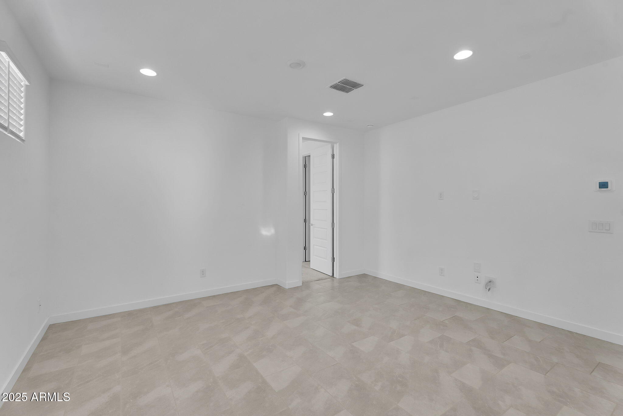 19948 West Flower Street Buckeye, AZ 85396 - Photo 24 of 58 a view of an empty room