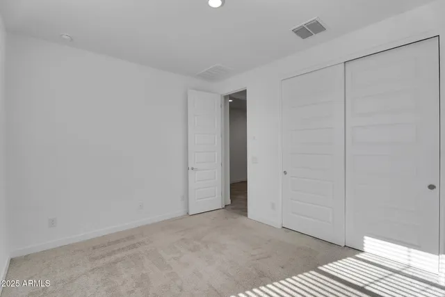 an empty room with cabinet