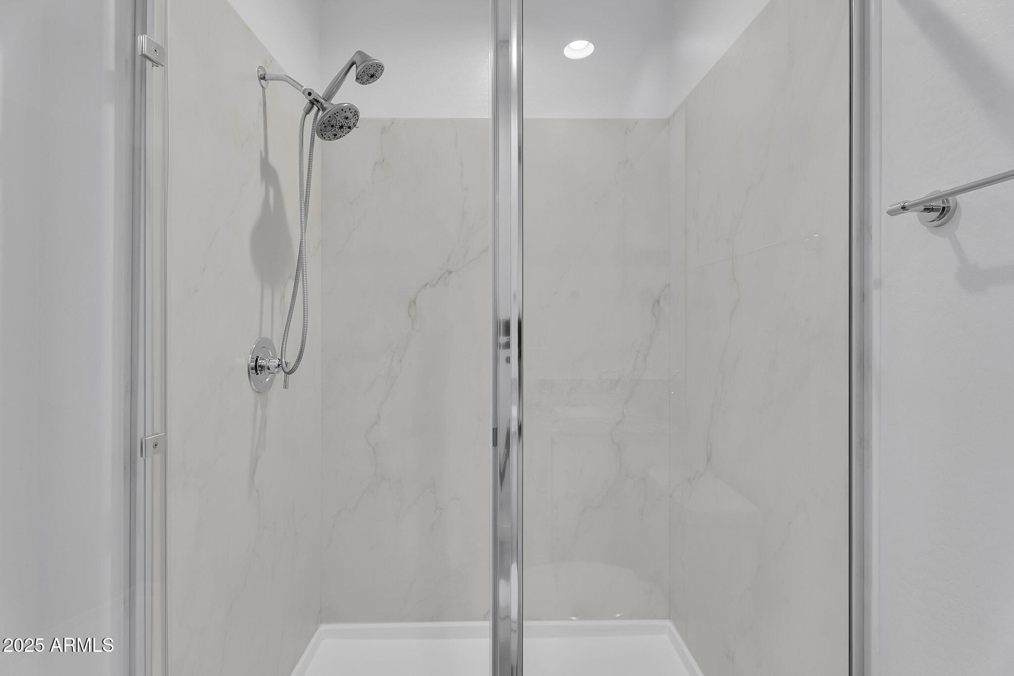 19948 West Flower Street Buckeye, AZ 85396 - Photo 37 of 58 a bathroom with a shower