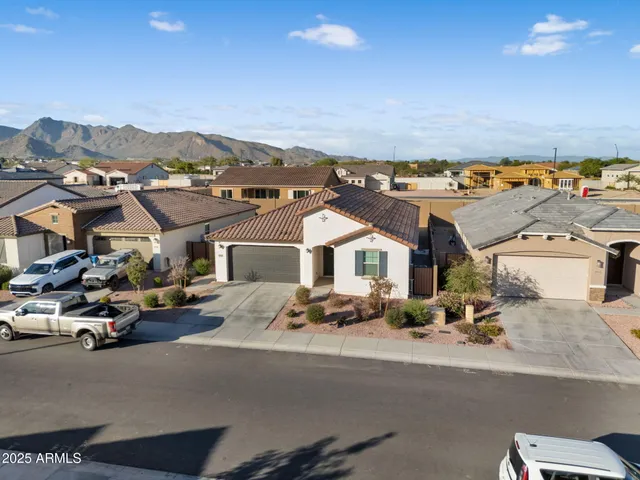 an aerial view of a house with a garden