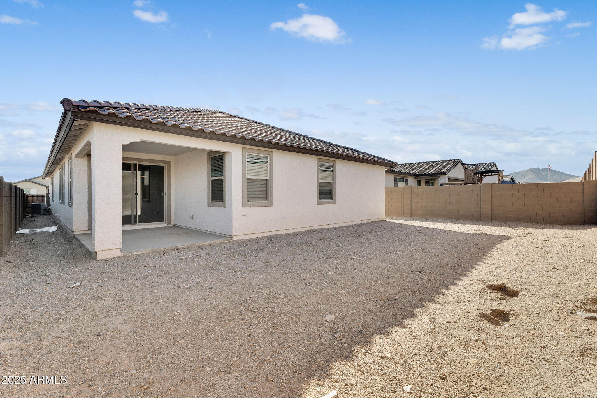 19948 West Flower Street Buckeye, AZ 85396 - Photo 42 of 58 a view of a house with a yard