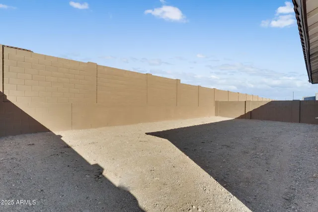 a view of a house with outdoor space and sitting area