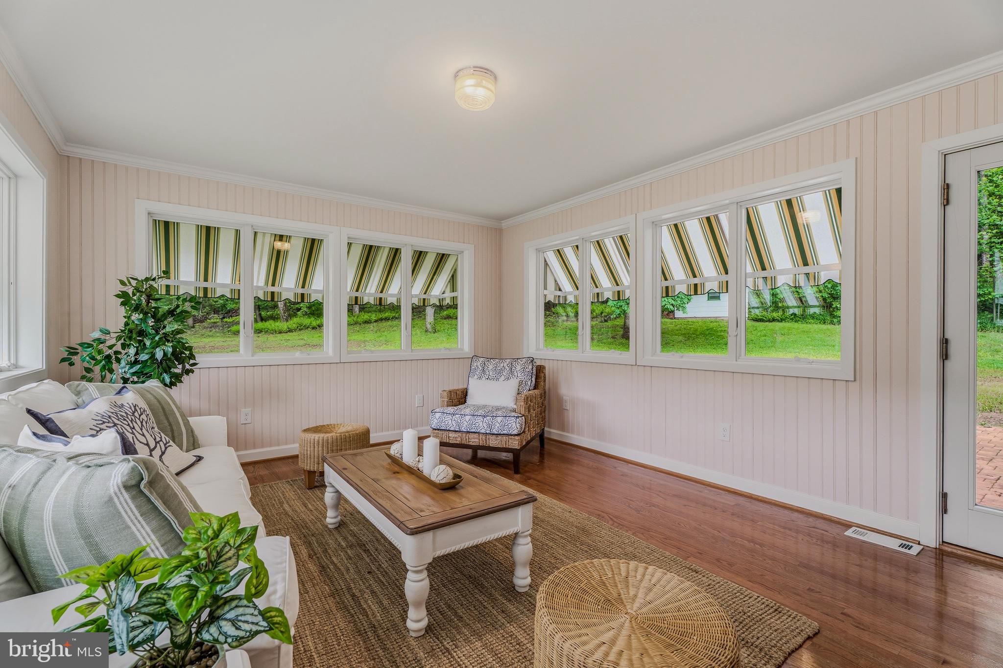 2425 Albert Rill Road Hampstead, MD 21074 - Photo 21 of 44 a living room with furniture and a potted plant