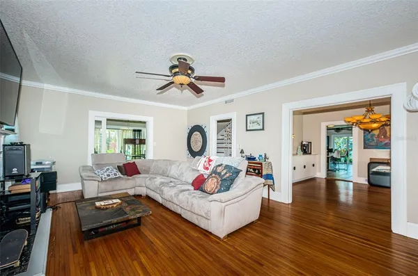 a kitchen with stainless steel appliances a sink cabinets and window