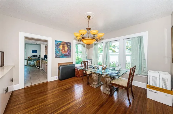 a view of a backyard with sitting area