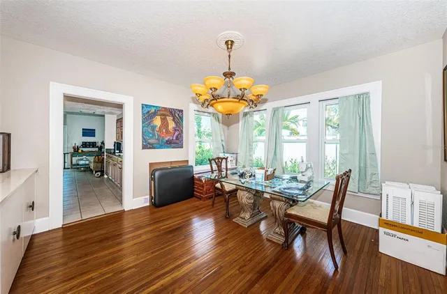 a view of a backyard with sitting area