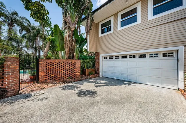 a view of a backyard with a garden