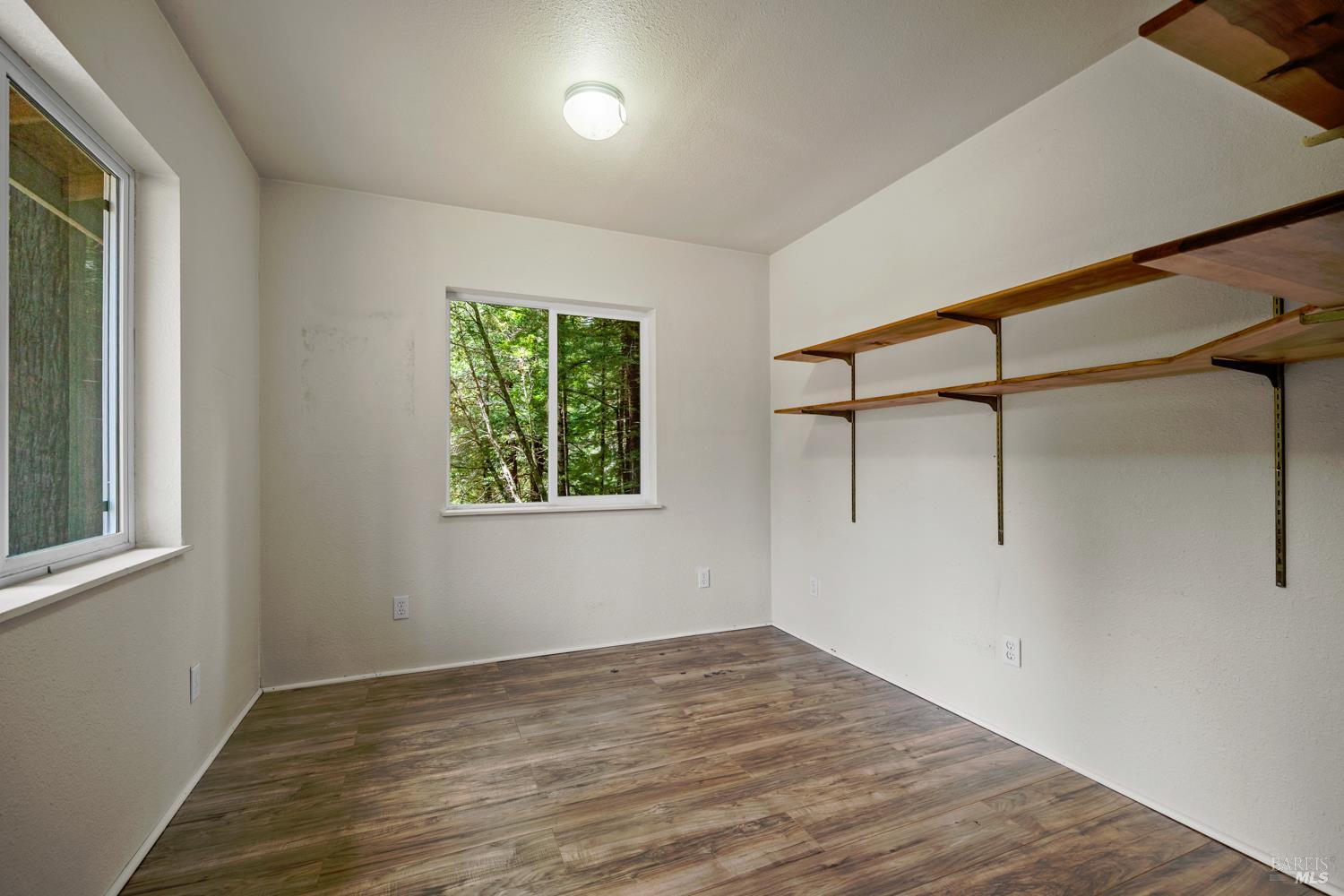 40440 Garcia River Road Point Arena, CA 95468 - Photo 34 of 49 southside studio room has shelving