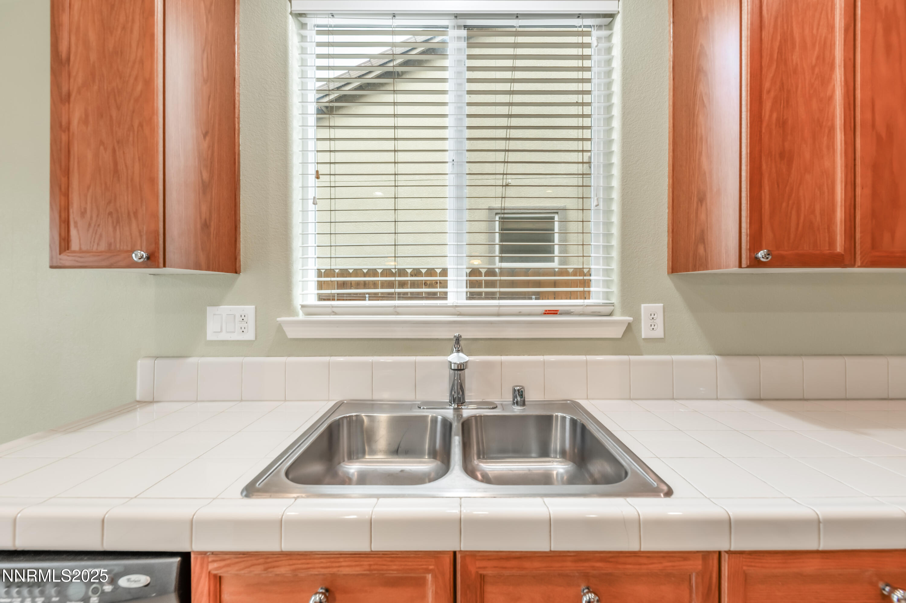 2180 Peaceful Valley Drive Reno, NV 89521 - Photo 12 of 31 a kitchen with a sink and a window