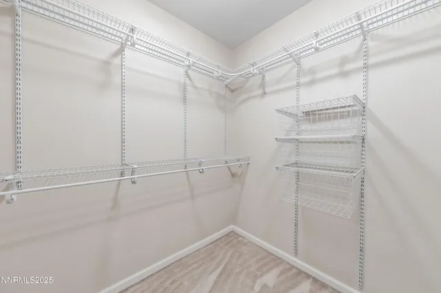 a view of a room with racks on the wall
