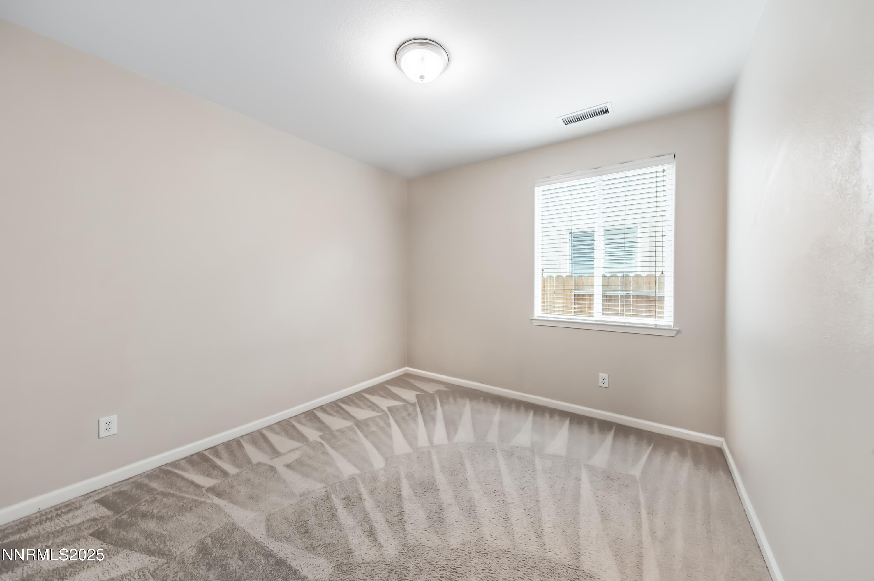 2180 Peaceful Valley Drive Reno, NV 89521 - Photo 26 of 31 an empty room with a window