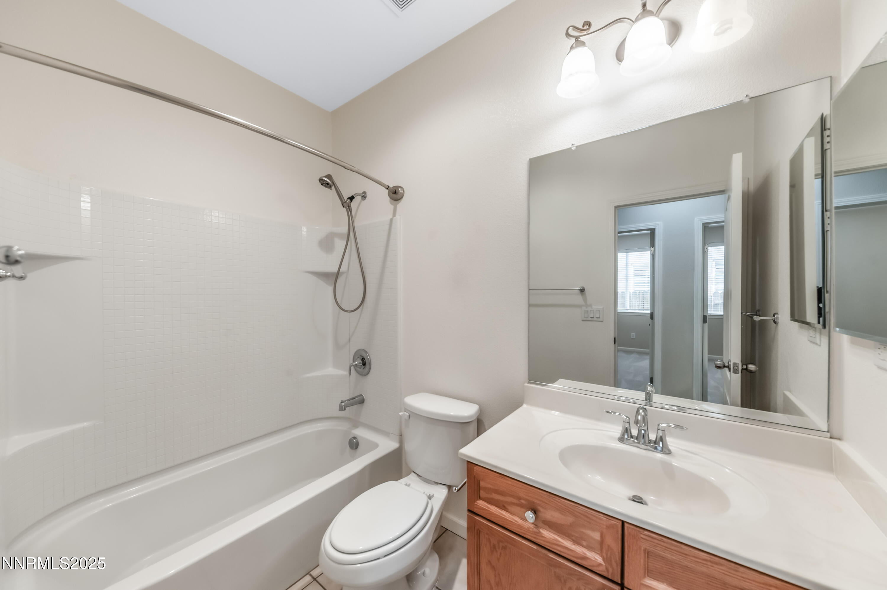 2180 Peaceful Valley Drive Reno, NV 89521 - Photo 27 of 31 a bathroom with a sink a toilet and shower