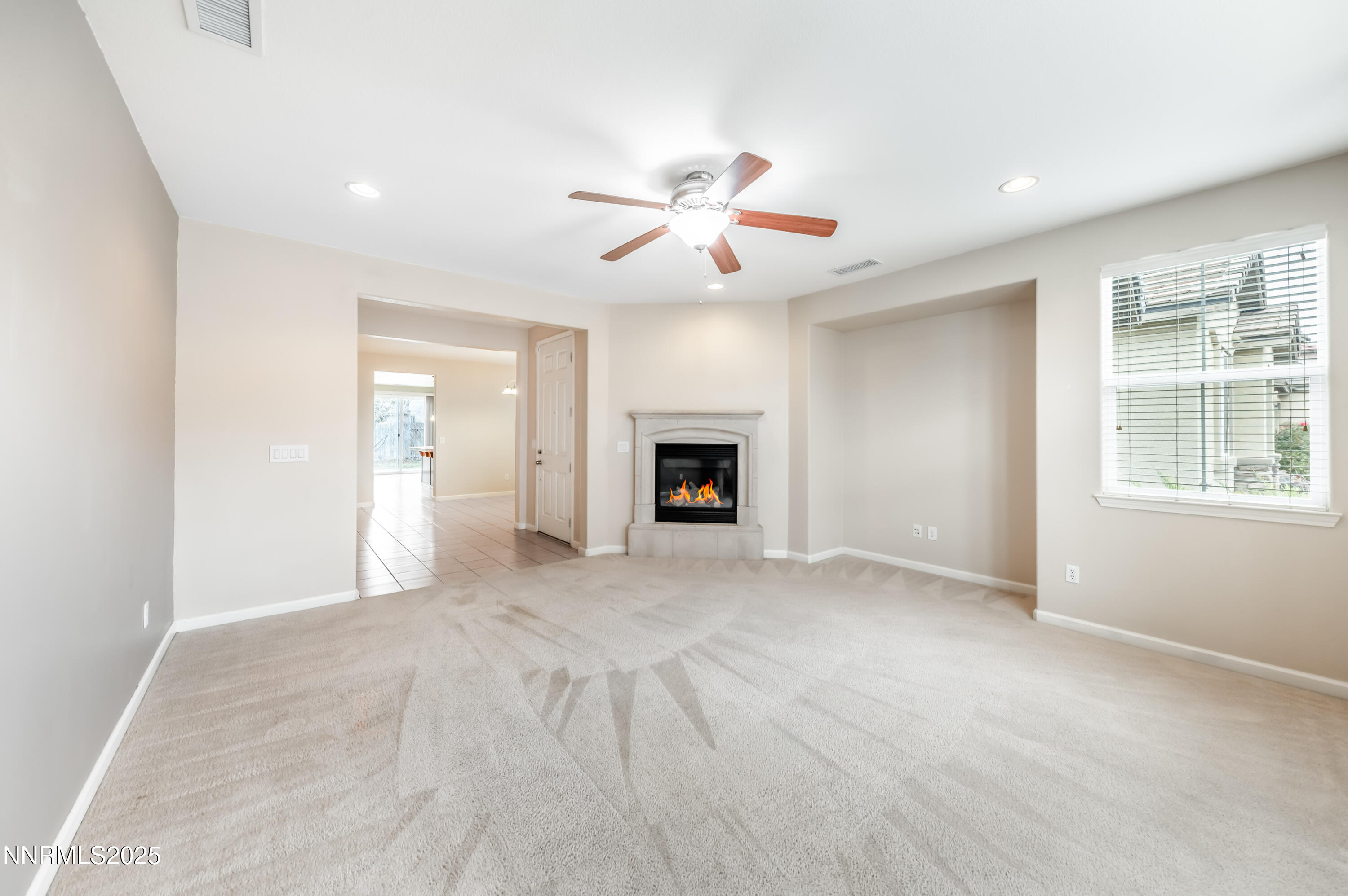 2180 Peaceful Valley Drive Reno, NV 89521 - Photo 6 of 31 a view of a livingroom with a fireplace and window