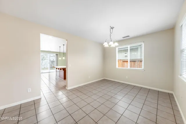 a view of an empty room with window