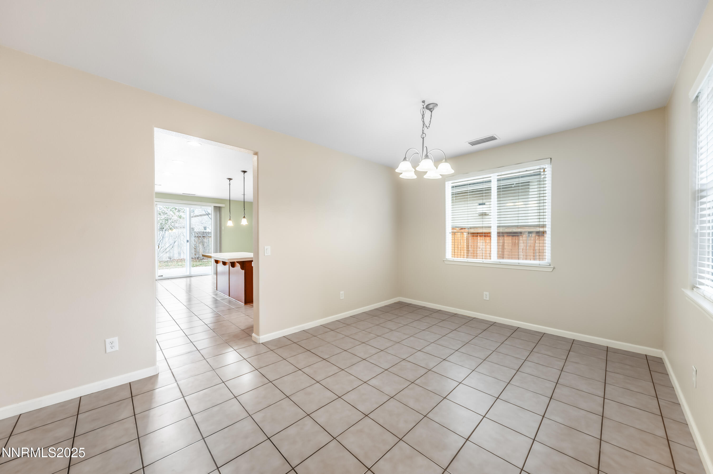 2180 Peaceful Valley Drive Reno, NV 89521 - Photo 8 of 31 a view of an empty room with window