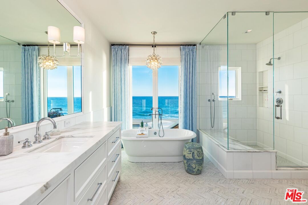 31412 Broad Beach Road Malibu, CA 90265 - Photo 16 of 32 a bathroom with a double vanity sink mirror and shower