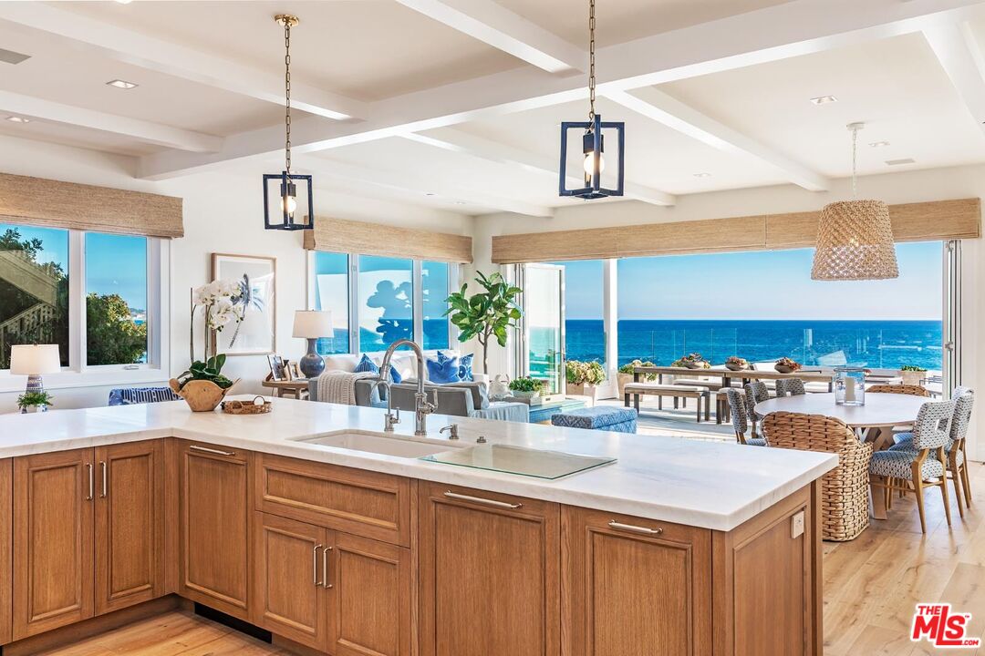 31412 Broad Beach Road Malibu, CA 90265 - Photo 9 of 32 a kitchen with a sink a counter space appliances and cabinets