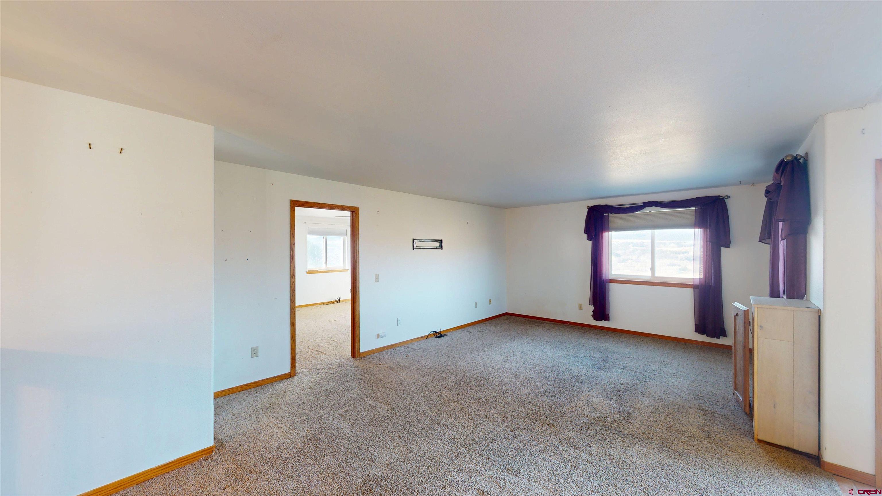 39865 Nelson Road Paonia, CO 81428 - Photo 17 of 38 a view of an empty room with a window