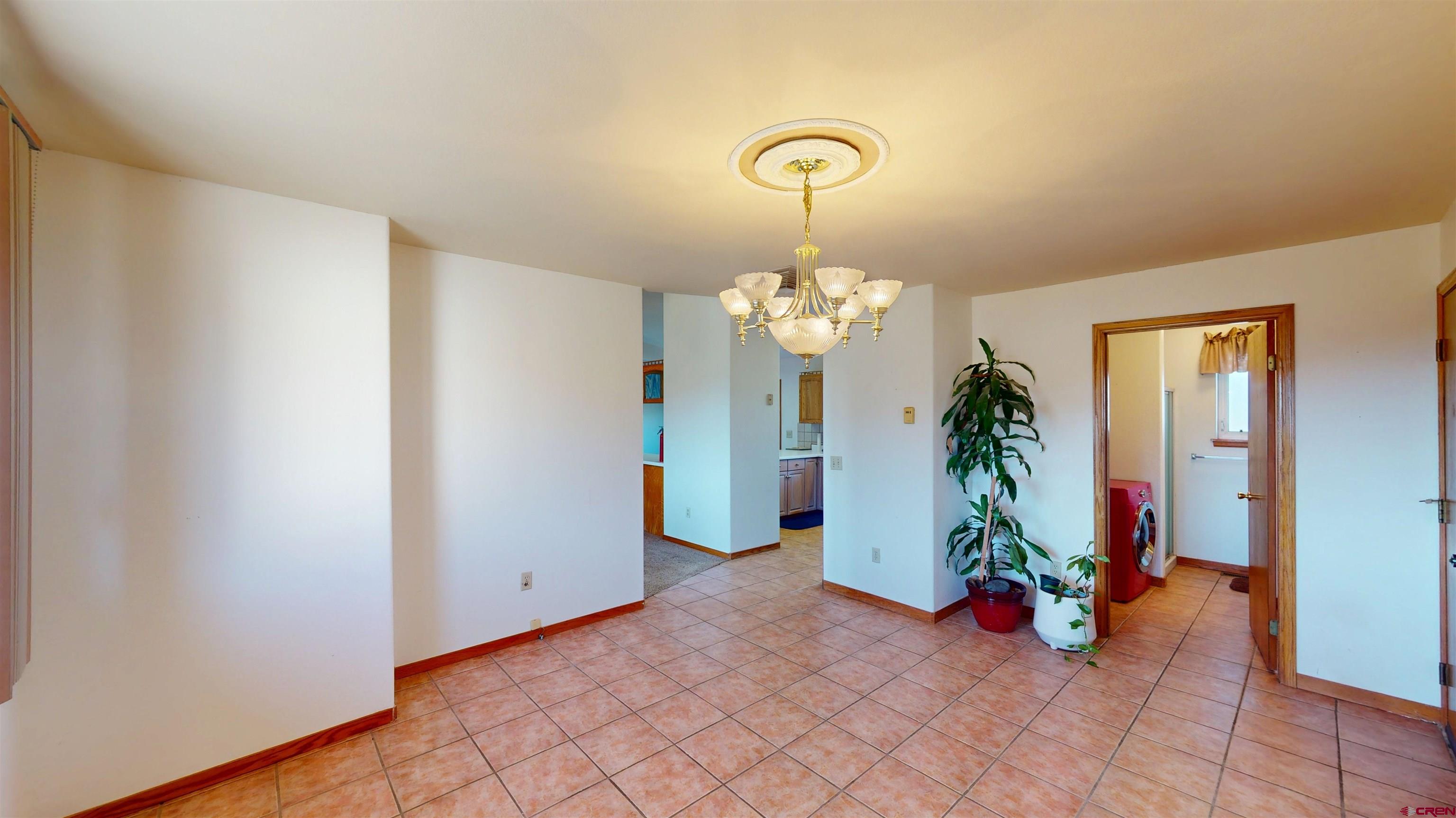 39865 Nelson Road Paonia, CO 81428 - Photo 22 of 38 a view of a bedroom with potted plants