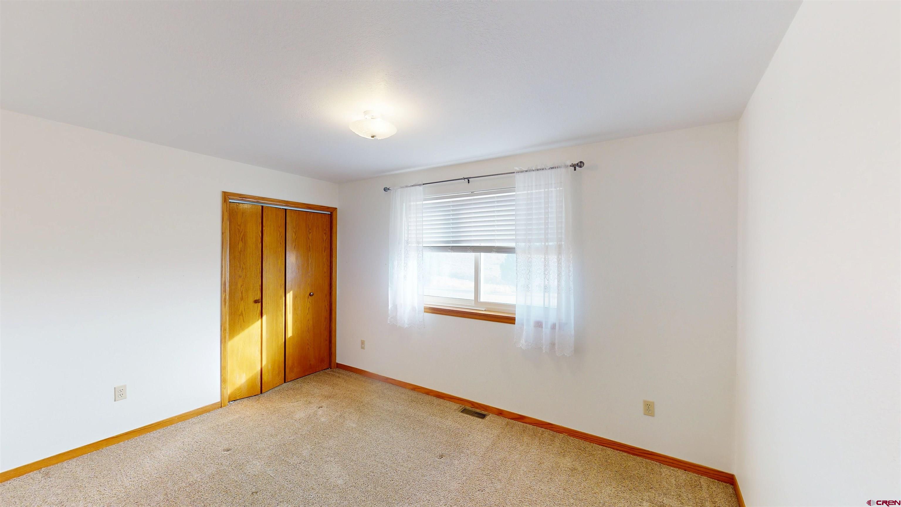 39865 Nelson Road Paonia, CO 81428 - Photo 27 of 38 an empty room with windows