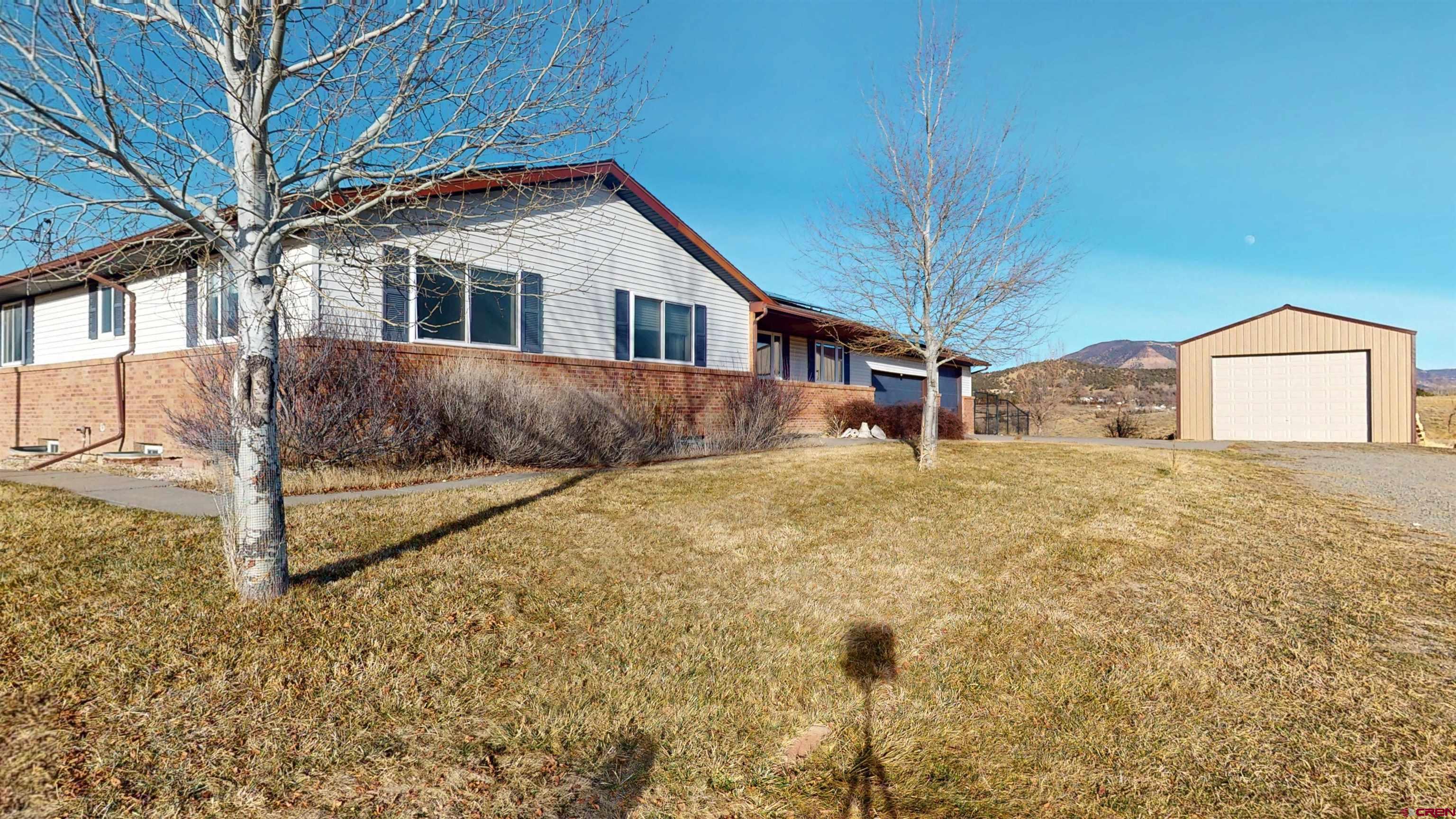 39865 Nelson Road Paonia, CO 81428 - Photo 3 of 38 a house view with a outdoor space